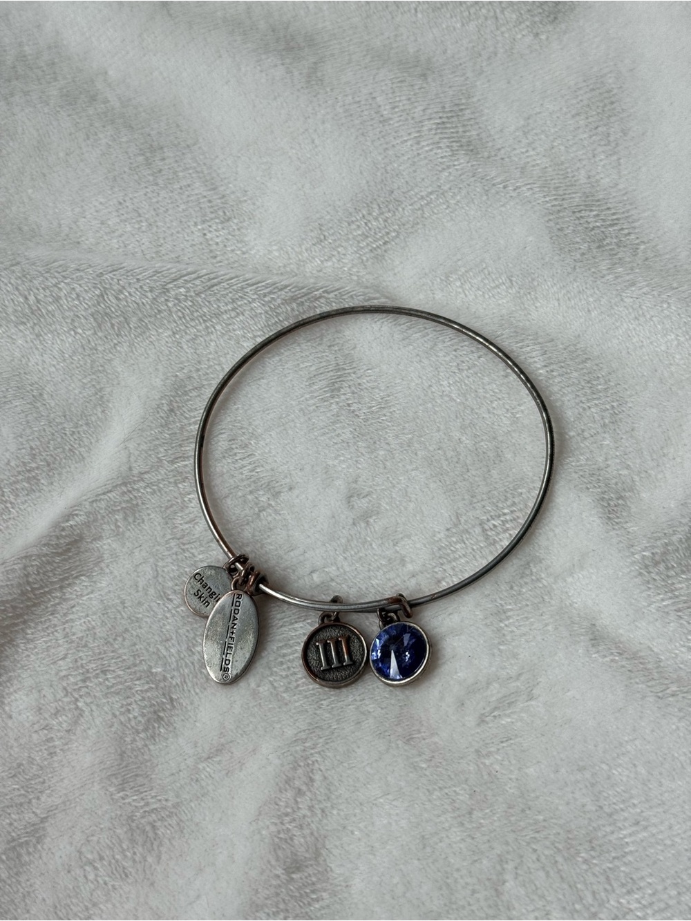 Rodan + Fields Silver Charm Bangle with Sapphire Blue Crystal Accent